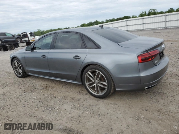 2017 Audi A8 z VIN WAU44AFD1HN009176, wystawiony jako Copart lot #57647675 z przebiegiem 94 317 mil mil oraz Szkoda całkowita • Salvage title. Historia ofert i sprzedaży dostępna na DreamBid. Obrazek 2.