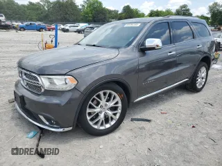 2014 Dodge Durango Citadel with VIN 1C4RDJEG5EC977969, listed as a Copart auction lot 59784185 with 184,381 mi miles and Clean title. Bid and sale history available at DreamBid. Image 1.