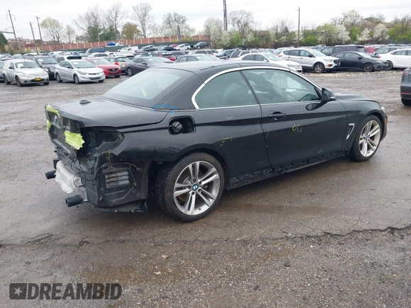 2015 BMW 4 Series 435i with VIN WBA3T3C57FP738517, listed as a IAAI auction lot 41975696 with 61,140 mi miles and . Bid and sale history available at carsss.com. Image 4.