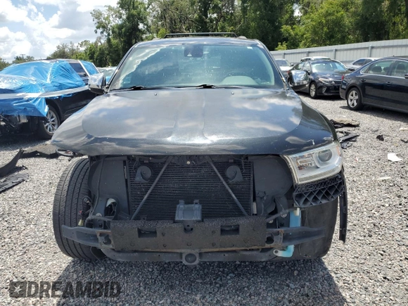2014 Dodge Durango Citadel with VIN 1C4SDJET1EC349261, listed as a Copart auction lot 61129465 with 201,451 mi miles and Salvage title. Bid and sale history available at DreamBid. Image 5.