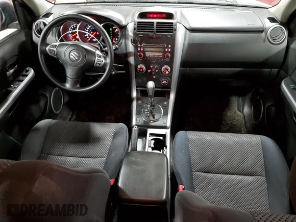 2006 Suzuki Grand Vitara Premium z VIN JS3TD943X64100331, wystawiony jako Copart lot #49650655 z przebiegiem 166 276 mil mil oraz Szkoda całkowita • Salvage title. Historia ofert i sprzedaży dostępna na DreamBid. Obrazek 8.