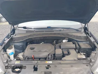2017 Hyundai Santa Fe 2.4L z VIN 5XYZU3LB7HG418300, wystawiony jako IAAI lot #42369329 z przebiegiem 126 326 mil mil oraz . Historia ofert i sprzedaży dostępna na DreamBid. Obrazek 10.