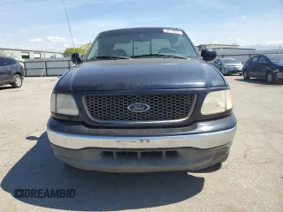 2000 Ford F-150 XL with VIN 1FTRX17L0YKA29295, listed as a Copart auction lot 50719525 with 0 mi miles and Salvage Title. Bid and sale history available at carsss.com. Image 5.