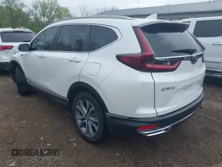 2020 Honda CR-V Touring with VIN 7FART6H9XLE024742, listed as a IAAI auction lot 42120164 with 32,213 mi miles and . Bid and sale history available at DreamBid. Image 3.
