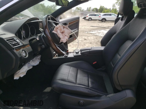 2015 Mercedes-Benz E 400 with VIN WDDKK6FFXFF295735, listed as a Copart auction lot 52134483 with 36,835 mi miles and Salvage title. Bid and sale history available at DreamBid. Image 7.