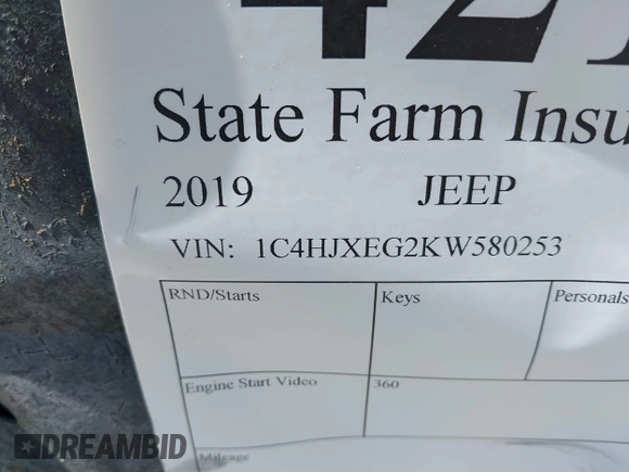 2019 Jeep Wrangler Unlimited Sahara with VIN 1C4HJXEG2KW580253, listed as a IAAI auction lot 42147018 with 8,394 mi miles and . Bid and sale history available at DreamBid. Image 9.