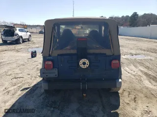 2002 Jeep Wrangler X with VIN 1J4FA39S82P735388, listed as a Copart auction lot 49511065 with 213,957 mi miles and Clean Title. Bid and sale history available at carsss.com. Image 6.