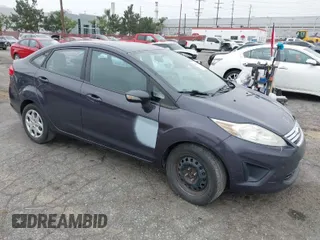 2013 Ford Fiesta SE with VIN 3FADP4BJ0DM199277, listed as a IAAI auction lot 42047833 with 142,739 mi miles. Bid and sale history available at carsss.com. Image 1.