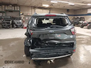 2017 Ford Escape SE with VIN 1FMCU9G9XHUB71008, listed as a IAAI auction lot 40909330 with 181,480 mi miles. Bid and sale history available at carsss.com. Image 6.