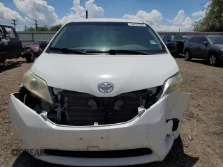 2014 Toyota Sienna L with VIN 5TDZK3DCXES463632, listed as a Copart auction lot 69957284 with 206,250 mi miles and Salvage Title. Bid and sale history available at carsss.com. Image 5.