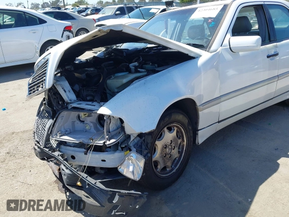 2000 Mercedes-Benz C 230 Kompressor with VIN WDBHA24GXYA833828, listed as a IAAI auction lot 42304685 with Not provided miles and . Bid and sale history available at DreamBid. Image 14.