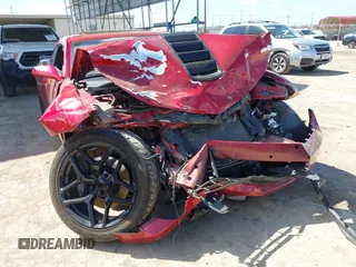2015 Chevrolet Camaro SS z VIN 2G1FJ1EW0F9144441, wystawiony jako IAAI lot #42230511 z przebiegiem 26 615 mil mil oraz . Historia ofert i sprzedaży dostępna na DreamBid. Obrazek 6.