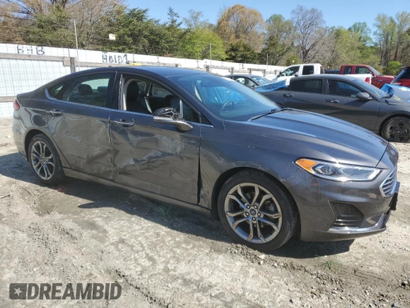 2020 Ford Fusion SEL z VIN 3FA6P0CD7LR196193, wystawiony jako Copart lot #53254465 z przebiegiem 79 944 mil mil oraz Szkoda całkowita • Salvage title. Historia ofert i sprzedaży dostępna na DreamBid. Obrazek 4.