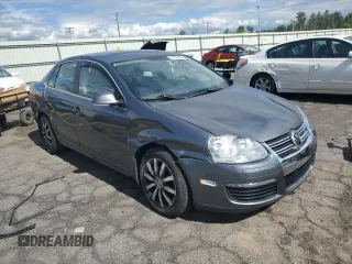 2009 Volkswagen Jetta SE with VIN 3VWRZ71K79M168084, listed as a Copart auction lot 57854825 with 150,986 mi miles and Salvage title. Bid and sale history available at DreamBid. Image 4.