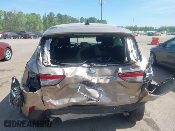 2020 Ford Escape SE with VIN 1FMCU9G6XLUA25108, listed as a IAAI auction lot 42106136 with 73,746 mi miles and . Bid and sale history available at DreamBid. Image 16.