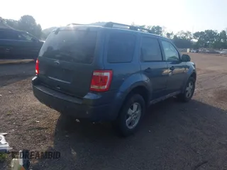 2011 Ford Escape XLT with VIN 1FMCU9D77BKB11600, listed as a IAAI auction lot 42579732 with 147,247 mi miles and . Bid and sale history available at DreamBid. Image 4.