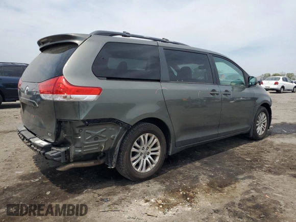 2011 Toyota Sienna XLE AAS with VIN 5TDYK3DC6BS124373, listed as a Copart auction lot 54265975 with 213,798 mi miles and Clean Title. Bid and sale history available at carsss.com. Image 3.