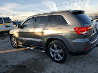 2011 Jeep Grand Cherokee Overland with VIN 1J4RS6GGXBC601757, listed as a Copart auction lot 82770454 with 132,109 mi miles and Salvage Title. Bid and sale history available at DreamBid. Image 2.