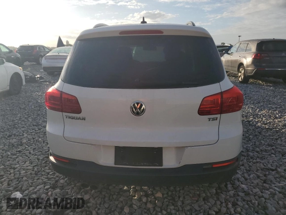 2017 Volkswagen Tiguan S with VIN WVGAV7AX3HK039090, listed as a Copart auction lot 60723615 with 72,311 mi miles and Salvage title. Bid and sale history available at DreamBid. Image 6.
