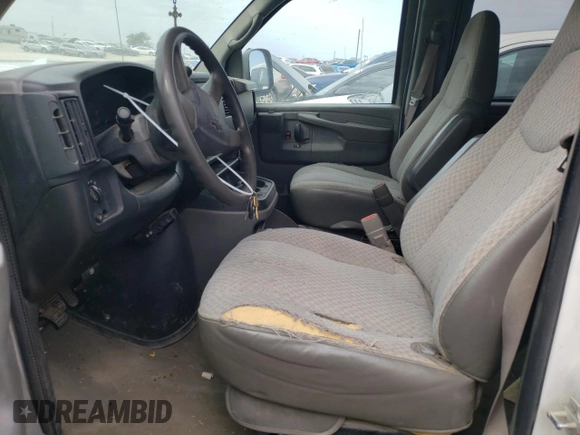 2005 Chevrolet Express Passenger with VIN 1GAHG39U051232615, listed as a Copart auction lot 73574264 with 207,303 mi miles and Salvage title. Bid and sale history available at DreamBid. Image 7.
