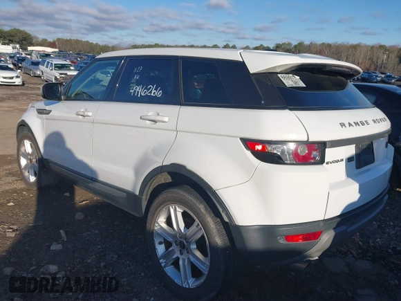 2013 Land Rover Range Rover Evoque Pure z VIN SALVN2BG2DH739464, wystawiony jako IAAI lot #41661683 z przebiegiem 103 227 mil mil oraz . Historia ofert i sprzedaży dostępna na DreamBid. Obrazek 3.
