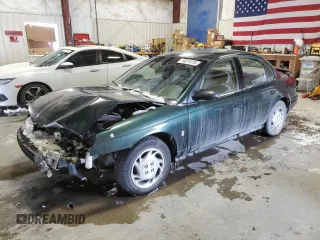 1997 Saturn SL z VIN 1G8ZJ5273VZ107990, wystawiony jako Copart lot #44818295 z przebiegiem 143 071 mil mil oraz Czysty tytuł • Clean title. Historia ofert i sprzedaży dostępna na DreamBid. Obrazek 1.