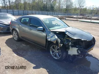 2013 Dodge Avenger SXT with VIN 1C3CDZCG7DN585431, listed as a IAAI auction lot 41975228 with 152,703 mi miles and . Bid and sale history available at carsss.com. Image 1.