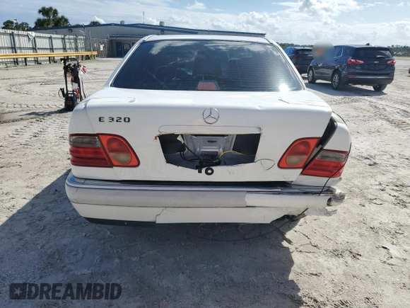 1997 Mercedes-Benz E-Class with VIN WDBJF55F2VJ024815, listed as a Copart auction lot 75228024 with 184,398 mi miles and Non Repairable. Bid and sale history available at carsss.com. Image 6.
