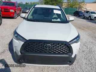 2022 Toyota Corolla Cross LE z VIN 7MUCAAAG3NV012231, wystawiony jako IAAI lot #42022931 z przebiegiem 30 335 mil mil oraz . Historia ofert i sprzedaży dostępna na DreamBid. Obrazek 6.