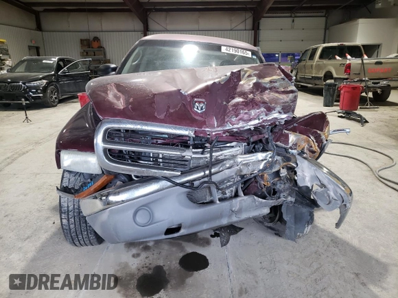 2001 Dodge Dakota Sport z VIN 1B7GG22NX1S172265, wystawiony jako Copart lot #42190165 z przebiegiem 109 799 mil mil oraz Szkoda całkowita • Salvage title. Historia ofert i sprzedaży dostępna na DreamBid. Obrazek 5.