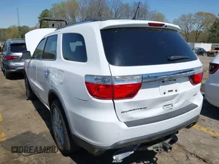 2013 Dodge Durango Crew with VIN 1C4RDHDG8DC698668, listed as a IAAI auction lot 41876841 with 160,012 mi miles and . Bid and sale history available at DreamBid. Image 3.