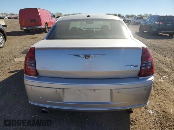 2006 Chrysler 300 C SRT8 with VIN 2C3LA73W06H471013, listed as a Copart auction lot 74204434 with 12,015 mi miles and Salvage Title. Bid and sale history available at carsss.com. Image 6.