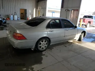 2002 Acura RL with VIN JH4KA96692C001363, listed as a Copart auction lot 41933965 with 170,358 mi miles and Salvage title. Bid and sale history available at DreamBid. Image 3.