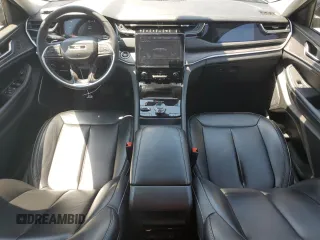 2023 Jeep Grand Cherokee with VIN 1C4RJYB64PC648891, listed as a Copart auction lot 61945935 with 37,970 mi miles and Clean title. Bid and sale history available at DreamBid. Image 8.