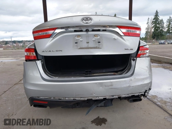 2014 Toyota Avalon Limited with VIN 4T1BK1EB3EU104576, listed as a IAAI auction lot 41773431 with 105,419 mi miles. Bid and sale history available at carsss.com. Image 6.