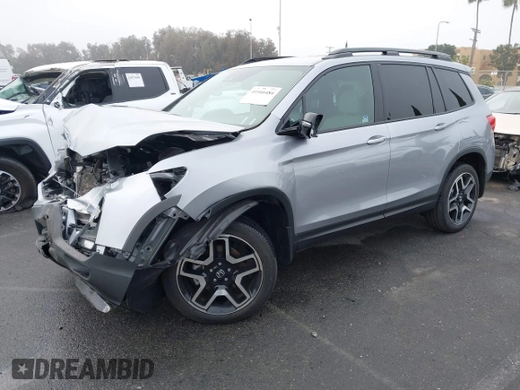 2023 Honda Passport Elite with VIN 5FNYF8H02PB029127, listed as a IAAI auction lot 41166484 with 16,200 mi miles and . Bid and sale history available at DreamBid. Image 17.