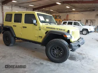 2022 Jeep Wrangler Unlimited Sport S with VIN 1C4HJXDG5NW237457, listed as a IAAI auction lot 42145444 with 28,203 mi miles and . Bid and sale history available at DreamBid. Image 1.
