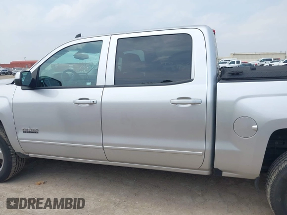 2018 Chevrolet Silverado 1500 LT with VIN 3GCPCREC8JG645232, listed as a IAAI auction lot 41927715 with 95,601 mi miles and . Bid and sale history available at DreamBid. Image 14.