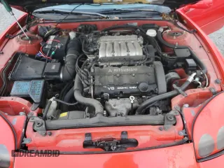 1996 Mitsubishi 3000GT z VIN JA3AM54J4TY003173, wystawiony jako Copart lot #79427334 z przebiegiem 112 036 mil mil oraz Czysty tytuł • Clean title. Historia ofert i sprzedaży dostępna na DreamBid. Obrazek 11.