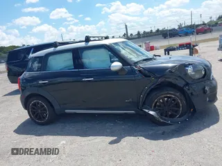 2016 MINI Countryman S z VIN WMWZC5C58GWU21536, wystawiony jako IAAI lot #41907958 z przebiegiem 83 761 mil mil oraz . Historia ofert i sprzedaży dostępna na DreamBid. Obrazek 12.