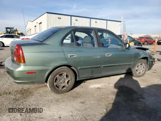 2004 Hyundai Accent GL with VIN KMHCG45C44U531828, listed as a Copart auction lot 86428134 with 92,054 mi miles and Salvage Title. Bid and sale history available at carsss.com. Image 3.