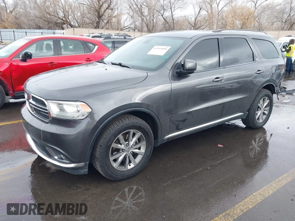 2015 Dodge Durango Limited with VIN 1C4RDJDG1FC873918, listed as a IAAI auction lot 41593090 with 137,871 mi miles and . Bid and sale history available at DreamBid. Image 18.
