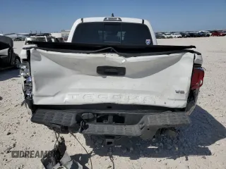 2021 Toyota Tacoma SR z VIN 3TMCZ5AN8MM387166, wystawiony jako Copart lot #49952935 z przebiegiem 63 175 mil mil oraz Szkoda całkowita • Salvage title. Historia ofert i sprzedaży dostępna na DreamBid. Obrazek 6.