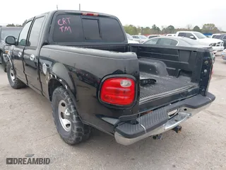 2001 Ford F-150 SuperCrew XLT with VIN 1FTRW07W51KD86453, listed as a IAAI auction lot 41314646 with 1 mi miles. Bid and sale history available at carsss.com. Image 3.