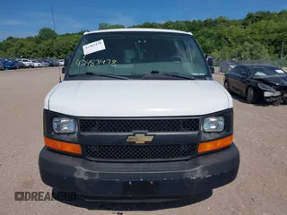 2014 Chevrolet Express Cargo with VIN 1GCSGAFX5E1152985, listed as a IAAI auction lot 42483478 with 208,518 mi miles and . Bid and sale history available at DreamBid. Image 12.