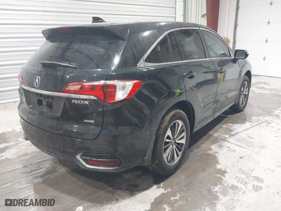 2017 Acura RDX w/Advance Pkg with VIN 5J8TB4H79HL005841, listed as a IAAI auction lot 41489042 with 113,626 mi miles. Bid and sale history available at carsss.com. Image 4.