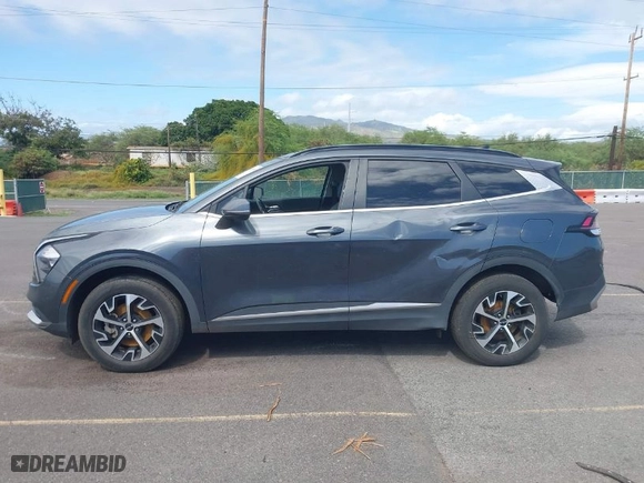 2023 Kia Sportage Hybrid EX with VIN KNDPVCAG5P7020209, listed as a IAAI auction lot 41409698 with 67,953 mi miles. Bid and sale history available at carsss.com. Image 15.