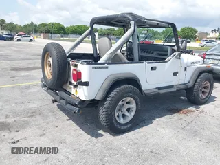 1990 Jeep Wrangler with VIN 2J4FY29T7LJ528844, listed as a IAAI auction lot 42354175 with 69,349 mi miles and . Bid and sale history available at DreamBid. Image 4.