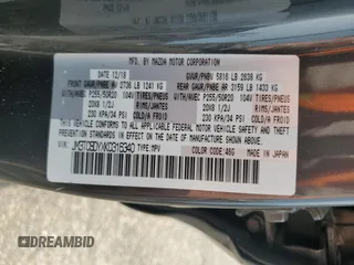 2019 Mazda CX-9 Grand Touring z VIN JM3TCBDYXK0316340, wystawiony jako Copart lot #58345485 z przebiegiem 97 263 mil mil oraz Szkoda całkowita • Salvage title. Historia ofert i sprzedaży dostępna na DreamBid. Obrazek 13.