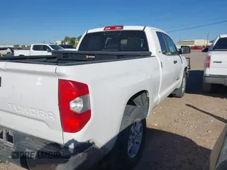 2016 Toyota Tundra 4WD Truck SR with VIN 5TFUW5F1XGX539529, listed as a IAAI auction lot 42044488 with 271,734 mi miles. Bid and sale history available at carsss.com. Image 4.